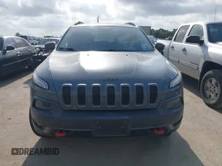 2014 Jeep Cherokee Trailhawk z VIN 1C4PJMBS2EW161276, wystawiony jako IAAI lot #42283358 z przebiegiem 135 201 mil mil oraz . Historia ofert i sprzedaży dostępna na DreamBid. Obrazek 12.
