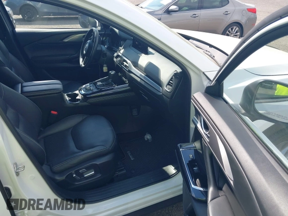 2021 Mazda CX-9 Grand Touring with VIN JM3TCBDY2M0541290, listed as a IAAI auction lot 42216643 with 38,661 mi miles and . Bid and sale history available at DreamBid. Image 5.
