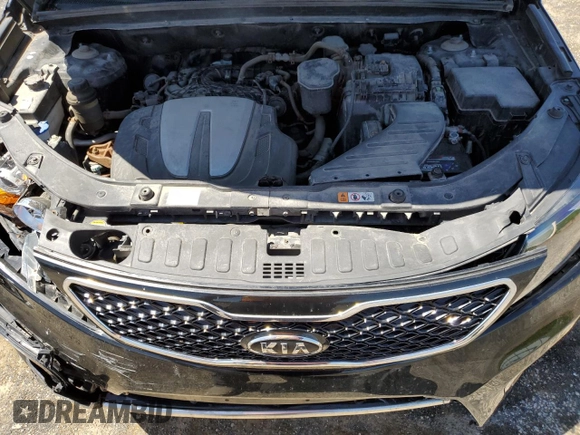 2013 Kia Sorento SX z VIN 5XYKW4A29DG382771, wystawiony jako Copart lot #55823745 z przebiegiem 279 700 mil mil oraz Szkoda całkowita • Salvage title. Historia ofert i sprzedaży dostępna na DreamBid. Obrazek 12.