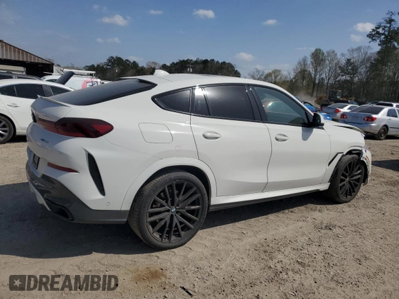 2022 BMW X6 xDrive40i z VIN 5UXCY6C0XN9K78927, wystawiony jako Copart lot #48348335 z przebiegiem 63 074 mil mil oraz Szkoda całkowita • Salvage title. Historia ofert i sprzedaży dostępna na DreamBid. Obrazek 3.