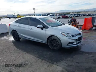 2018 Chevrolet Cruze LS with VIN 1G1BC5SM5J7182051, listed as a IAAI auction lot 41014751 with 112,749 mi miles and . Bid and sale history available at DreamBid. Image 1.