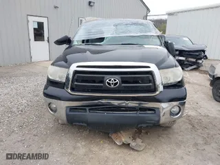 2012 Toyota Tundra 4WD Truck with VIN 5TFUM5F18CX028952, listed as a IAAI auction lot 41497110 with 242,526 mi miles. Bid and sale history available at carsss.com. Image 6.