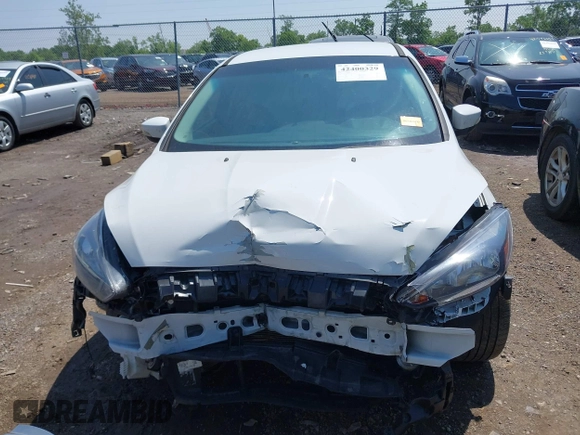 2016 Ford Focus SE with VIN 1FADP3F27GL385739, listed as a IAAI auction lot 42400329 with 114,331 mi miles and . Bid and sale history available at DreamBid. Image 13.