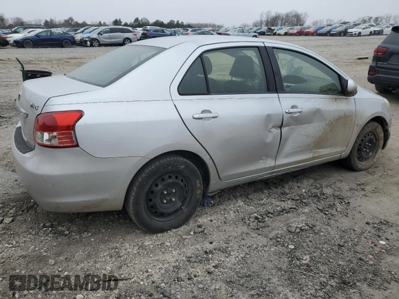 2012 Toyota Yaris with VIN JTDBT4K35CL037319, listed as a Copart auction lot 46098585 with 126,039 mi miles and Salvage Title. Bid and sale history available at DreamBid. Image 3.