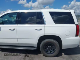 2018 Chevrolet Tahoe Commercial z VIN 1GNLCDEC1JR155210, wystawiony jako IAAI lot #42845068 z przebiegiem 159 456 mil mil oraz . Historia ofert i sprzedaży dostępna na DreamBid. Obrazek 20.