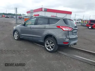 2013 Ford Escape Titanium with VIN 1FMCU0J92DUB36428, listed as a IAAI auction lot 42144682 with 263,600 mi miles and . Bid and sale history available at carsss.com. Image 3.