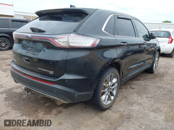 2015 Ford Edge Titanium z VIN 2FMTK4K88FBC26324, wystawiony jako IAAI lot #42156964 z przebiegiem Nie podano mil oraz . Historia ofert i sprzedaży dostępna na DreamBid. Obrazek 4.