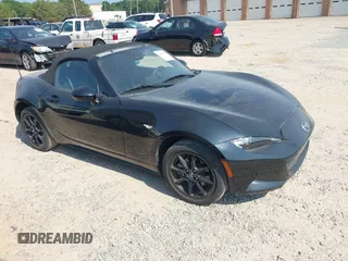 2021 Mazda MX-5 Miata Sport with VIN JM1NDAB73M0454064, listed as a IAAI auction lot 42613537 with 24,630 mi miles and . Bid and sale history available at DreamBid. Image 1.