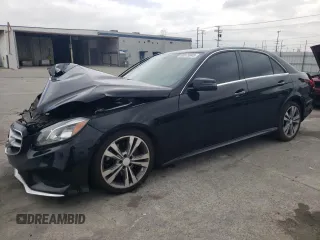 2014 Mercedes-Benz E 350 Sport with VIN WDDHF5KB7EB050618, listed as a Copart auction lot 50875045 with 157,722 mi miles and Salvage Title. Bid and sale history available at DreamBid. Image 1.