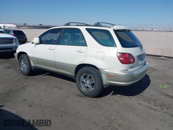 1999 Lexus RX 300 z VIN JT6GF10U2X0011802, wystawiony jako IAAI lot #42393239 z przebiegiem 152 558 mil mil oraz . Historia ofert i sprzedaży dostępna na DreamBid. Obrazek 3.