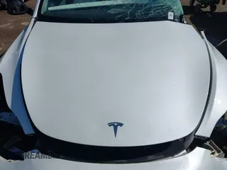 2021 Tesla Model Y Performance z VIN 5YJYGDEF0MF076263, wystawiony jako IAAI lot #42134022 z przebiegiem Nie podano mil oraz . Historia ofert i sprzedaży dostępna na DreamBid. Obrazek 10.