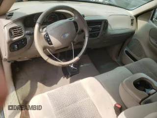 2002 Ford F-150 XL z VIN 1FTRX18L12NB86774, wystawiony jako Copart lot #59634165 z przebiegiem 262 567 mil mil oraz Szkoda całkowita • Salvage title. Historia ofert i sprzedaży dostępna na DreamBid. Obrazek 8.
