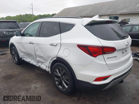 2018 Hyundai Santa Fe Ultimate with VIN 5NMZW4LA3JH088349, listed as a IAAI auction lot 42168983 with 66,884 mi miles and . Bid and sale history available at DreamBid. Image 3.