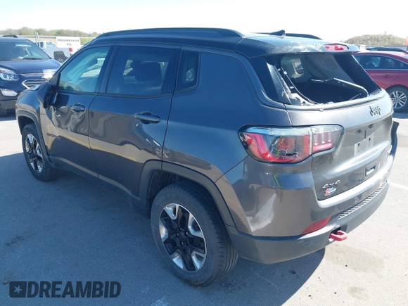 2019 Jeep Compass Trailhawk with VIN 3C4NJDDB0KT619337, listed as a IAAI auction lot 42171160 with 63,869 mi miles and . Bid and sale history available at DreamBid. Image 3.