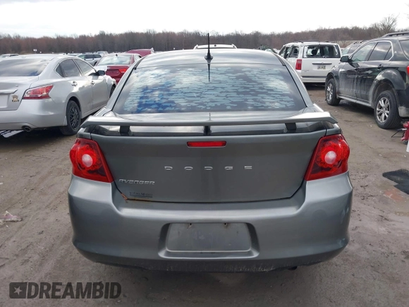 2013 Dodge Avenger SXT with VIN 1C3CDZCB7DN746154, listed as a IAAI auction lot 41834458 with 161,906 mi miles and . Bid and sale history available at DreamBid. Image 16.