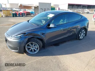2023 Tesla Model Y Long Range with VIN 7SAYGDEE0PF928836, listed as a IAAI auction lot 41538742 with 9,630 mi miles and . Bid and sale history available at DreamBid. Image 19.