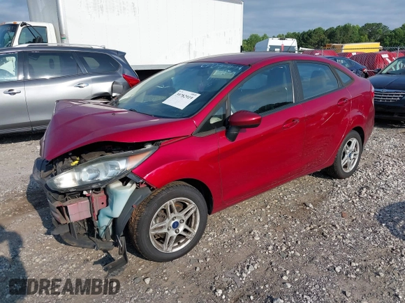 2017 Ford Fiesta SE with VIN 3FADP4BJ1HM110452, listed as a IAAI auction lot 39782919 with 199,370 mi miles and . Bid and sale history available at DreamBid. Image 2.