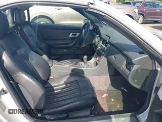 2004 Mercedes-Benz SLK-Class with VIN WDBKK49F44F298409, listed as a IAAI auction lot 41520249 with 135,503 mi miles. Bid and sale history available at carsss.com. Image 8.