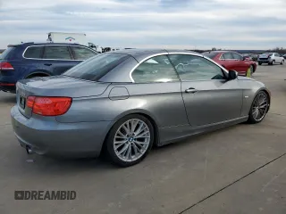 2011 BMW 3 Series 335i with VIN WBADX7C5XBE261099, listed as a Copart auction lot 42295595 with 106,018 mi miles and Clean Title. Bid and sale history available at carsss.com. Image 3.