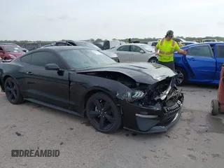 2023 Ford Mustang EcoBoost z VIN 1FA6P8TH4P5112129, wystawiony jako IAAI lot #42065880 z przebiegiem 27 716 mil mil oraz . Historia ofert i sprzedaży dostępna na DreamBid. Obrazek 1.