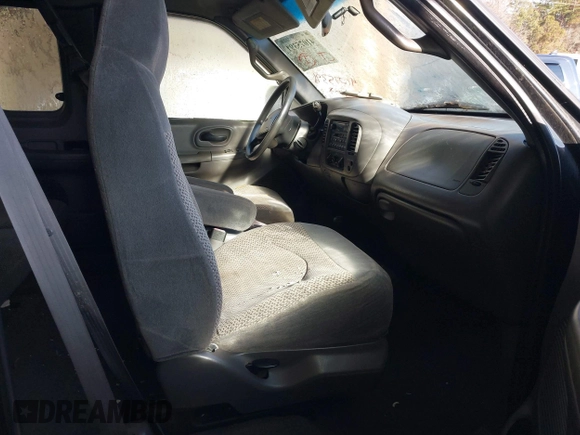 2000 Ford F-150 XL with VIN 1FTRX18LXYNA19385, listed as a IAAI auction lot 41075391 with 214,624 mi miles and . Bid and sale history available at DreamBid. Image 5.