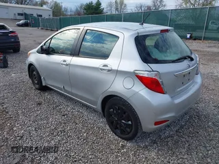 2013 Toyota Yaris L with VIN JTDKTUD32DD559222, listed as a IAAI auction lot 41883929 with 156,479 mi miles. Bid and sale history available at carsss.com. Image 3.