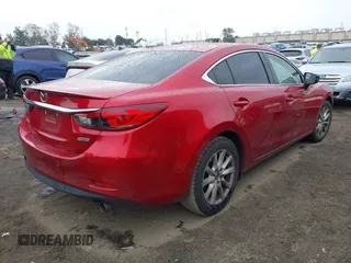 2016 Mazda 6 i Sport with VIN JM1GJ1U54G1457194, listed as a IAAI auction lot 41725704 with 109,628 mi miles and . Bid and sale history available at DreamBid. Image 4.