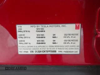 2013 Tesla Model S with VIN 5YJSA1CN7DFP26996, listed as a IAAI auction lot 42244540 with 128,160 mi miles and . Bid and sale history available at DreamBid. Image 9.