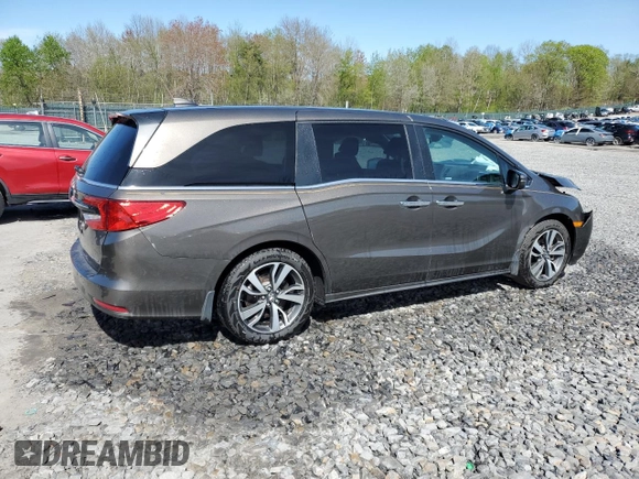 2023 Honda Odyssey Touring with VIN 5FNRL6H89PB034171, listed as a Copart auction lot 55039095 with Not Provided miles and Salvage Title. Bid and sale history available at DreamBid. Image 3.