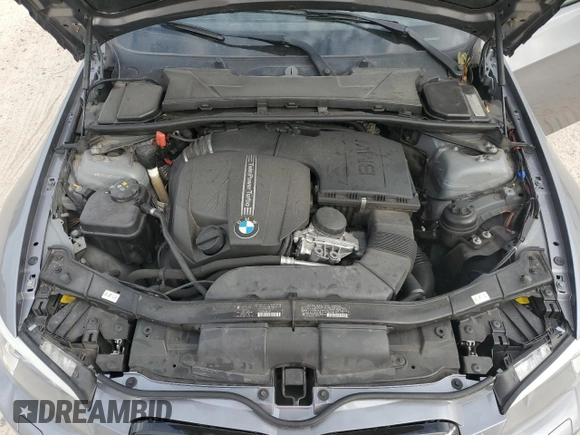 2012 BMW 3 Series 335i z VIN WBADX7C58CE744687, wystawiony jako Copart lot #83197624 z przebiegiem 157 416 mil mil oraz Szkoda całkowita • Salvage title. Historia ofert i sprzedaży dostępna na DreamBid. Obrazek 11.