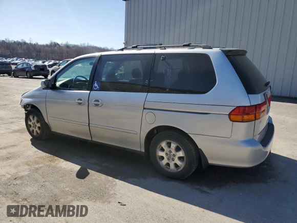 2004 Honda Odyssey EX-L with VIN 5FNRL18994B117140, listed as a Copart auction lot 49677635 with 247,237 mi miles and Salvage Title. Bid and sale history available at DreamBid. Image 2.