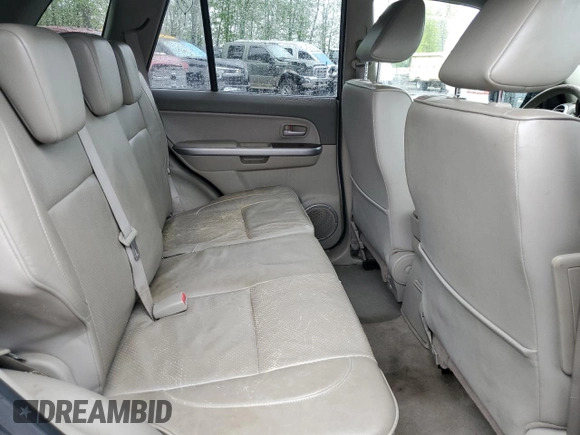 2006 Suzuki Grand Vitara Luxury with VIN JS3TD947364101307, listed as a Copart auction lot 55037585 with 198,616 mi miles and Salvage title. Bid and sale history available at DreamBid. Image 11.
