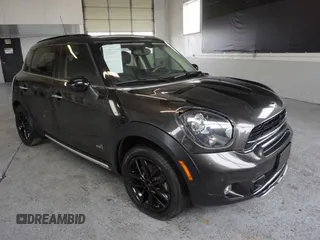 2016 MINI Countryman S with VIN WMWZC5C55GWU00997, listed as a Copart auction lot 48536605 with 41,217 mi miles and Salvage Title. Bid and sale history available at DreamBid. Image 1.