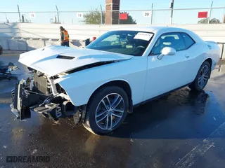 2019 Dodge Challenger SXT with VIN 2C3CDZGG3KH676194, listed as a IAAI auction lot 41324134 with 63,896 mi miles. Bid and sale history available at carsss.com. Image 2.