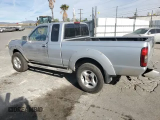 2001 Nissan Frontier SE Desert Runner with VIN 1N6ED26T11C345641, listed as a Copart auction lot 85855154 with 227,928 mi miles and Salvage title. Bid and sale history available at DreamBid. Image 2.
