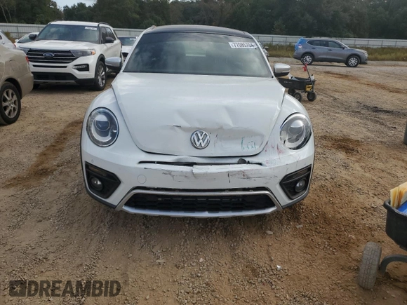 2016 Volkswagen Beetle with VIN 3VWS07AT5GM621801, listed as a Copart auction lot 77085764 with Not Provided miles and Salvage Title. Bid and sale history available at DreamBid. Image 5.