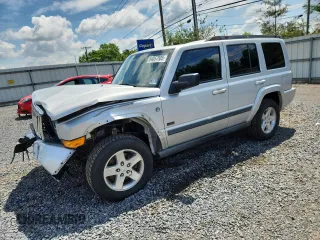 2007 Jeep Commander Sport z VIN 1J8HG48P47C691235, wystawiony jako Copart lot #64057505 z przebiegiem 135 641 mil mil oraz Szkoda całkowita • Salvage title. Historia ofert i sprzedaży dostępna na DreamBid. Obrazek 1.