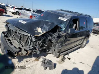 2002 GMC Yukon Denali z VIN 1GKEK63U82J183182, wystawiony jako Copart lot #86099644 z przebiegiem Nie podano mil oraz Szkoda całkowita • Salvage title. Historia ofert i sprzedaży dostępna na DreamBid. Obrazek 1.