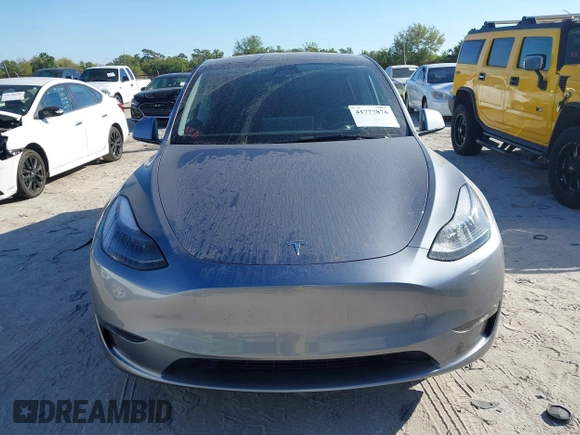 2025 Tesla Model Y Long Range with VIN 7SAYGDED7SA376233, listed as a IAAI auction lot 41777876 with 70 mi miles and . Bid and sale history available at DreamBid. Image 12.