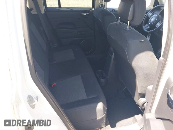 2014 Jeep Patriot Sport with VIN 1C4NJPBA6ED511990, listed as a IAAI auction lot 42644248 with 113,296 mi miles and . Bid and sale history available at DreamBid. Image 8.