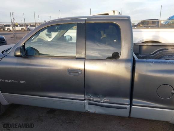 2002 Dodge Dakota SLT with VIN 1B7GL42X42S682184, listed as a IAAI auction lot 41784688 with 168,298 mi miles. Bid and sale history available at carsss.com. Image 14.