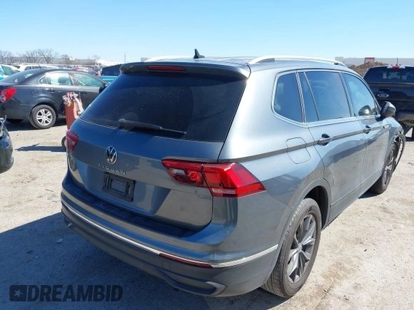 2023 Volkswagen Tiguan SE with VIN 3VV3B7AX5PM142378, listed as a IAAI auction lot 41835204 with 13,670 mi miles and . Bid and sale history available at DreamBid. Image 4.