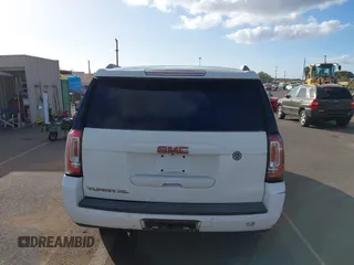 2015 GMC Yukon XL SLT with VIN 1GKS1HKC2FR612690, listed as a IAAI auction lot 41234188 with 113,830 mi miles. Bid and sale history available at carsss.com. Image 16.