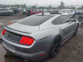 2023 Ford Mustang EcoBoost with VIN 1FA6P8TH9P5105743, listed as a IAAI auction lot 42525135 with 31,116 mi miles and . Bid and sale history available at DreamBid. Image 4.