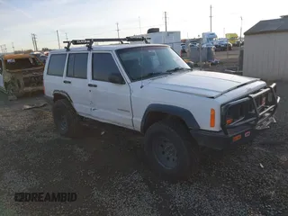 2000 Jeep Cherokee z VIN 1J4FF28P6YL132738, wystawiony jako IAAI lot #41382855 z przebiegiem 196 213 mil mil oraz . Historia ofert i sprzedaży dostępna na DreamBid. Obrazek 1.