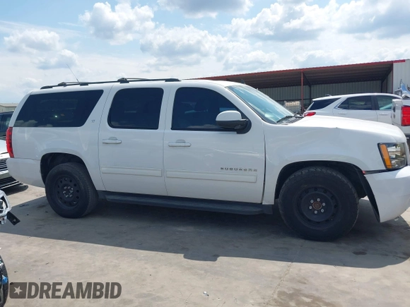 2013 Chevrolet Suburban LT with VIN 1GNSCJE08DR102735, listed as a IAAI auction lot 42228063 with 101,671 mi miles and . Bid and sale history available at DreamBid. Image 14.