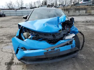 2019 Toyota C-HR XLE with VIN NMTKHMBX4KR097964, listed as a Copart auction lot 50431145 with 0 mi miles and Salvage Title. Bid and sale history available at carsss.com. Image 5.