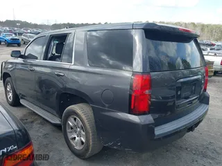 2017 Chevrolet Tahoe Commercial with VIN 1GNLCDEC2HR256539, listed as a IAAI auction lot 41718466 with 202,134 mi miles. Bid and sale history available at carsss.com. Image 3.
