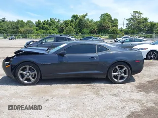 2013 Chevrolet Camaro LT with VIN 2G1FC1E38D9160609, listed as a IAAI auction lot 42646283 with 215,814 mi miles and . Bid and sale history available at DreamBid. Image 14.