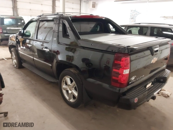 2012 Chevrolet Avalanche LTZ with VIN 3GNTKGE7XCG151943, listed as a IAAI auction lot 41774003 with 123,512 mi miles. Bid and sale history available at carsss.com. Image 3.